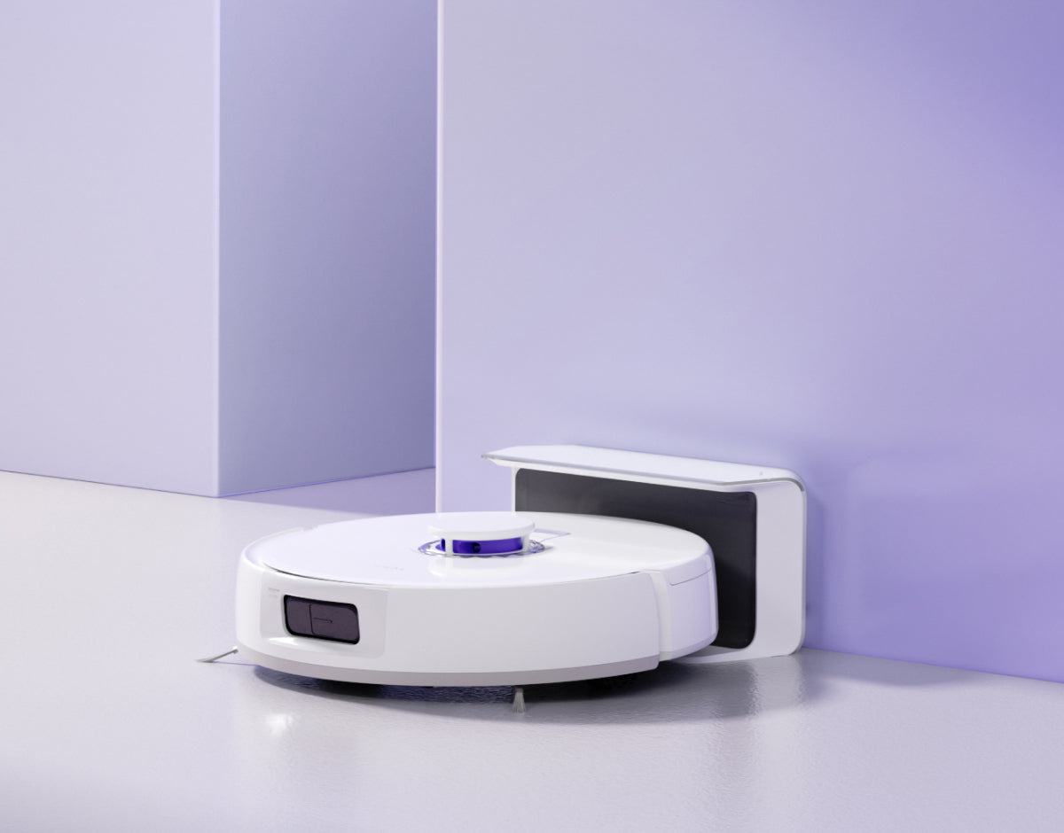 This is a Narwal Freo X Plus robot vacuum in light purple background.